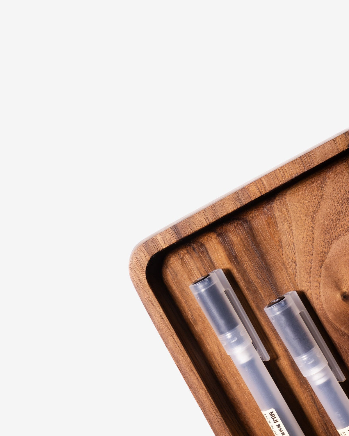 Detail shot of the catchall tray in walnut