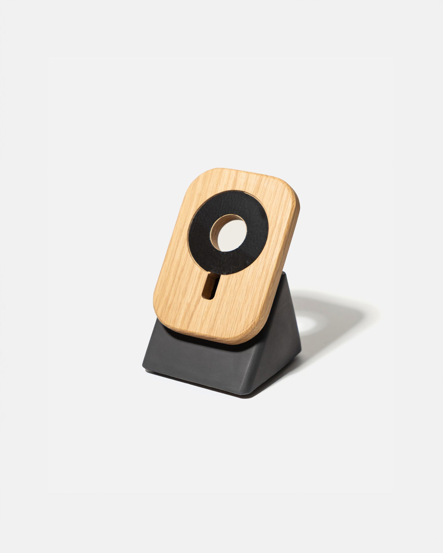 The Upright MagSafe Stand by Modhaus in aWood and Concrete design