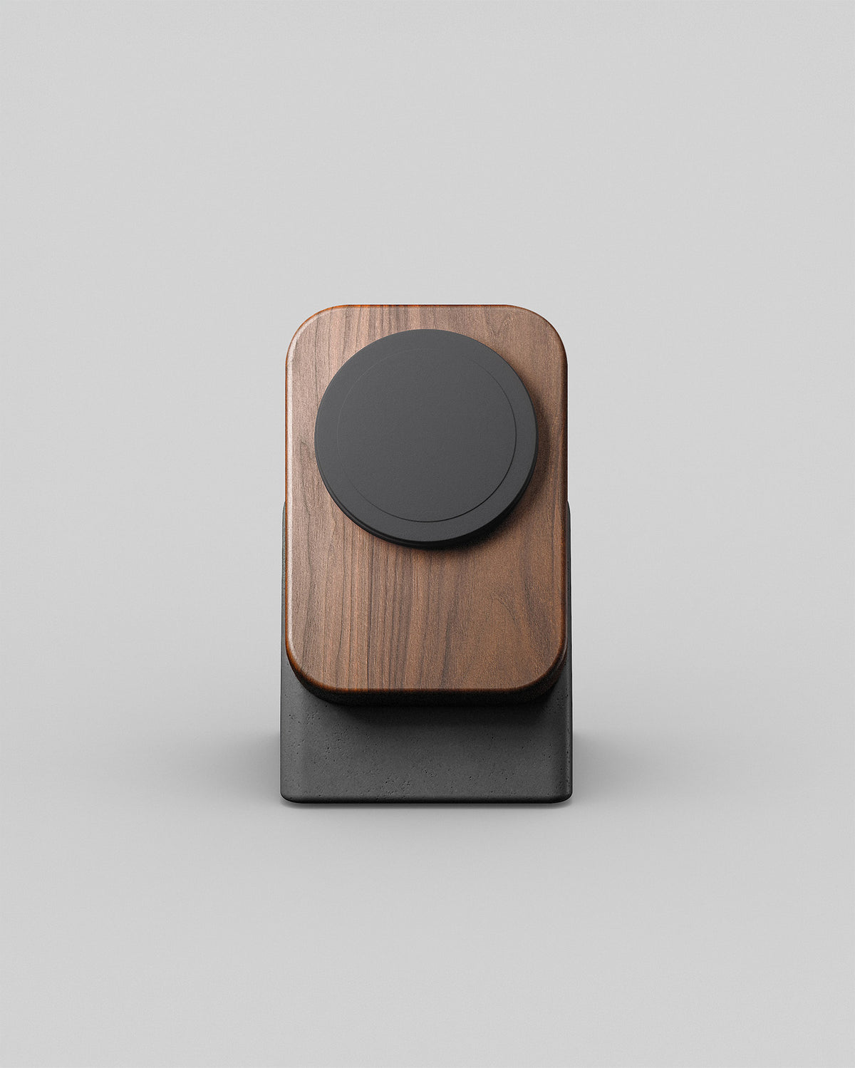 A modern wireless phone charger called the Upright By Modhaus. Wood and concrete charging stand on a light background
