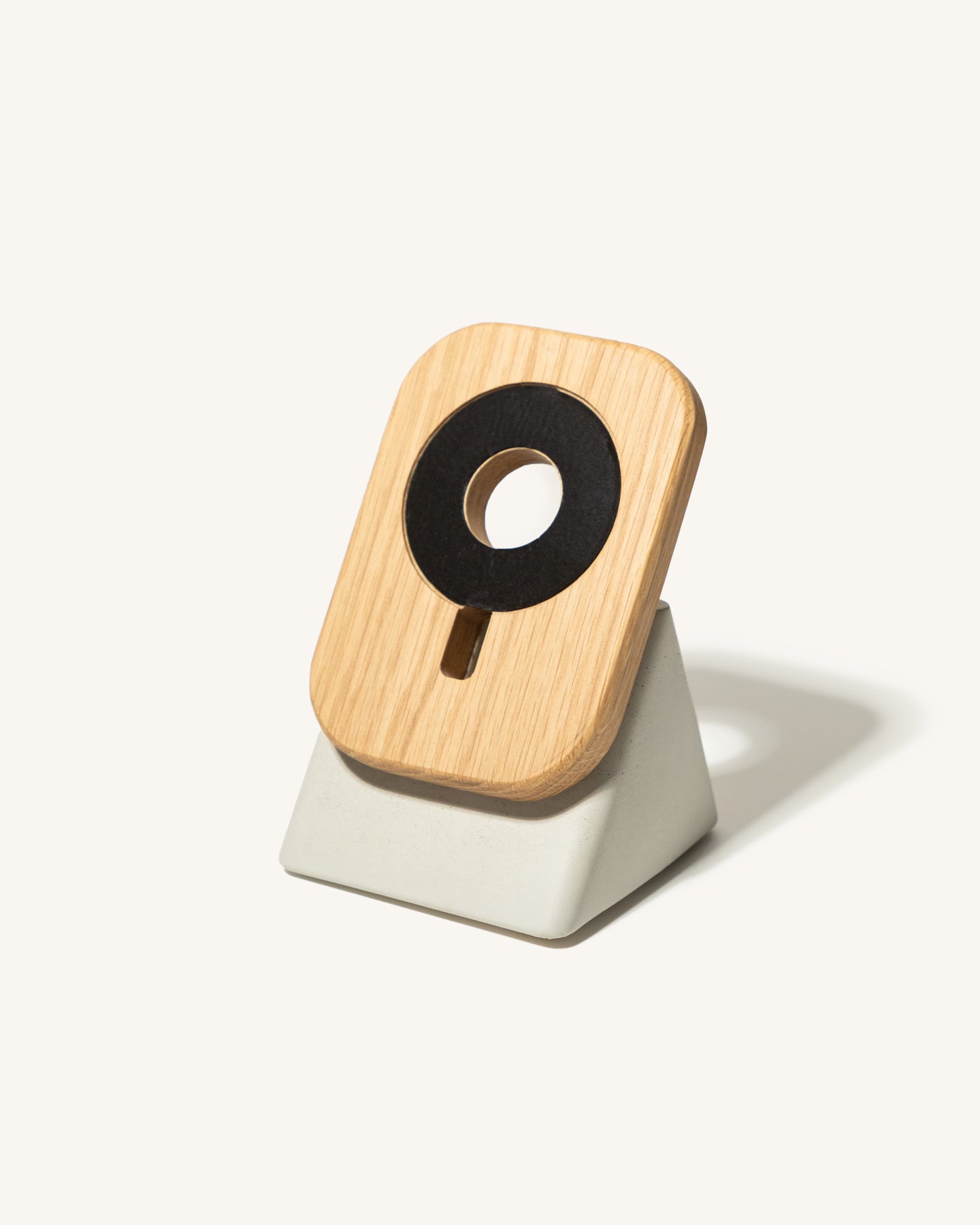 The Upright MagSafe Stand by Modhaus in concrete and wood 