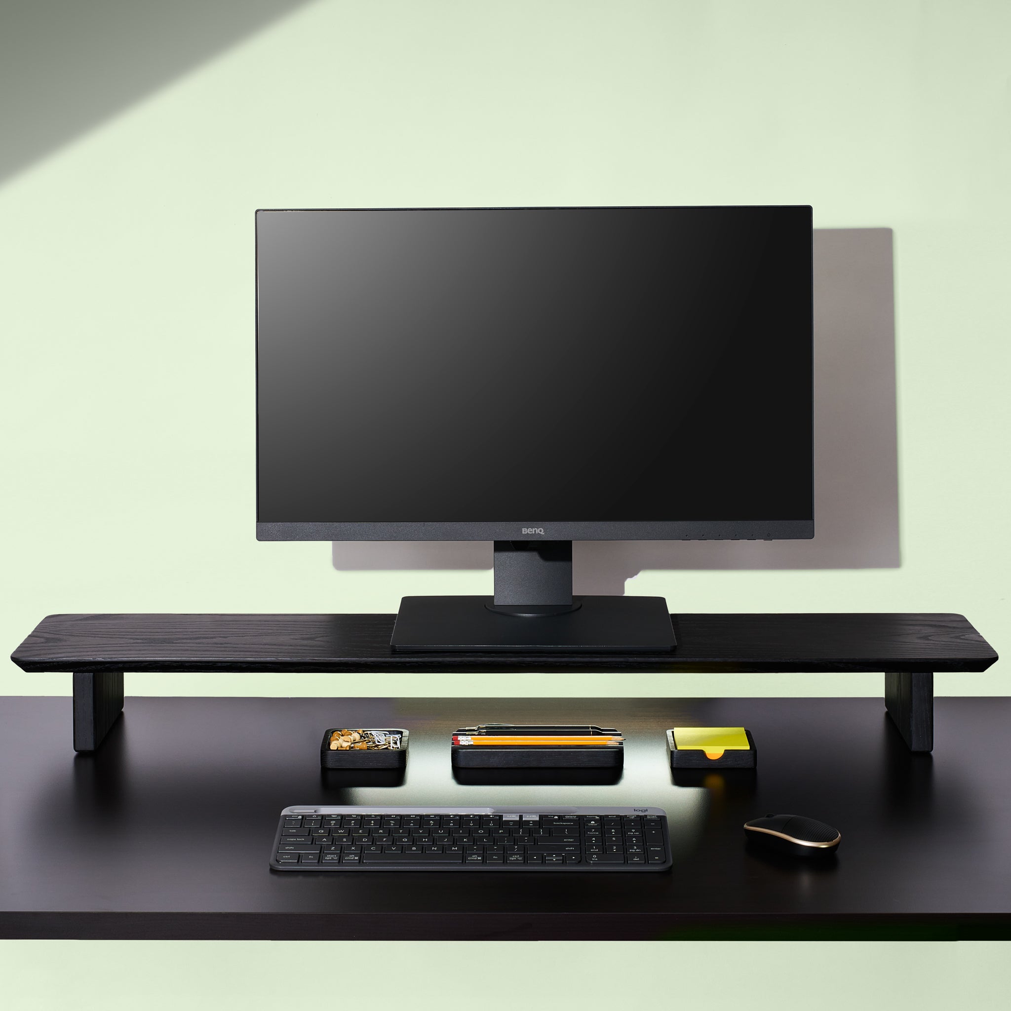 A large Black desk shelf with the essentials desk accessories