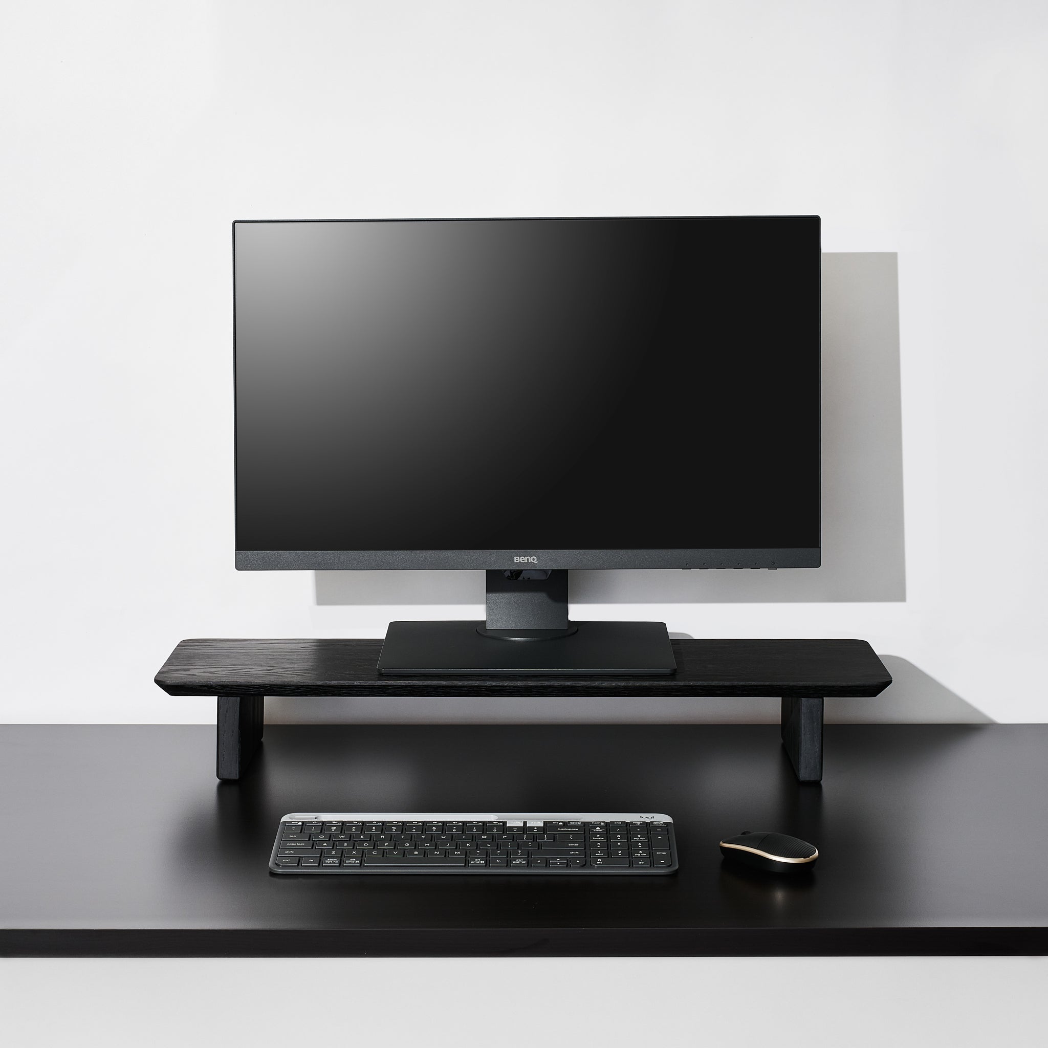 A medium Black desk shelf