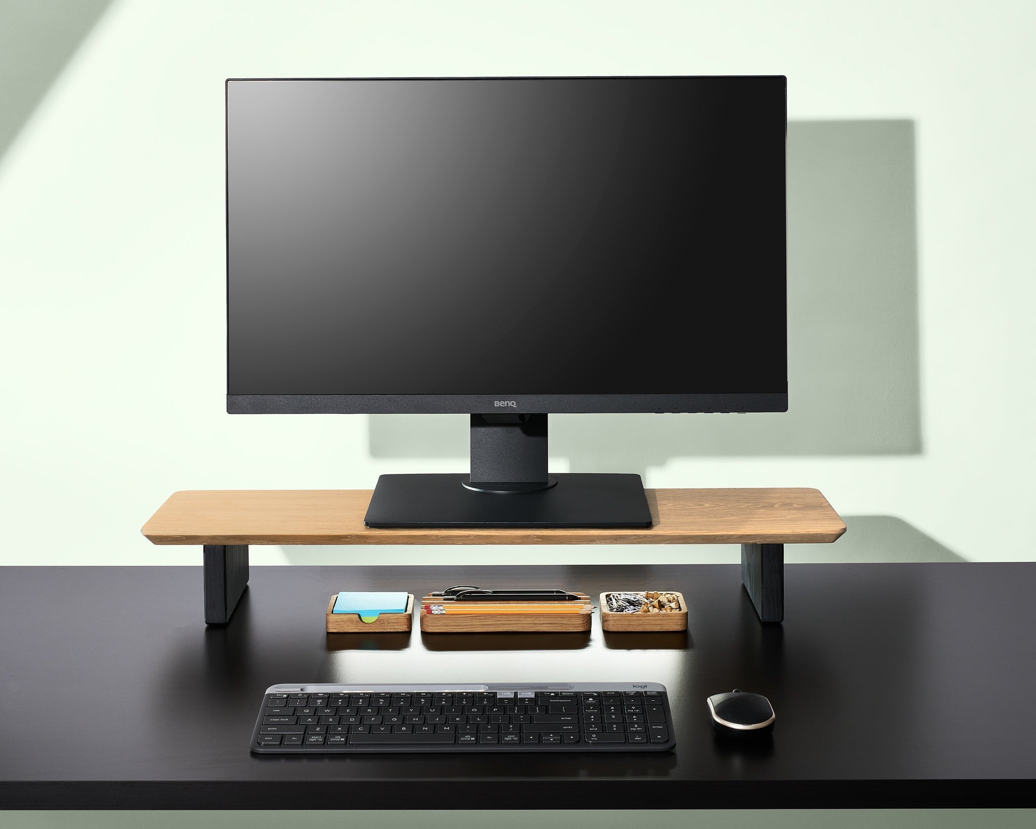 A medium White Oak desk shelf with the essentials desk accessories