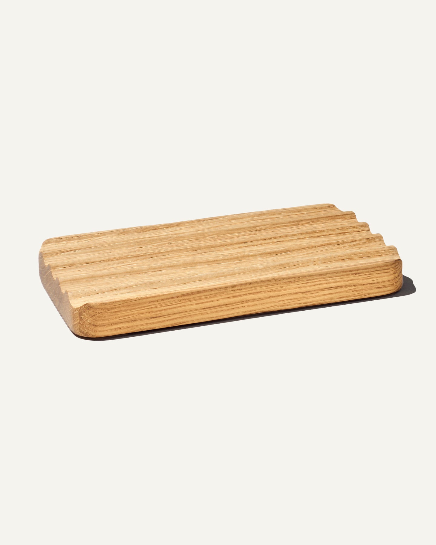 The modhaus solid wood wave pen tray