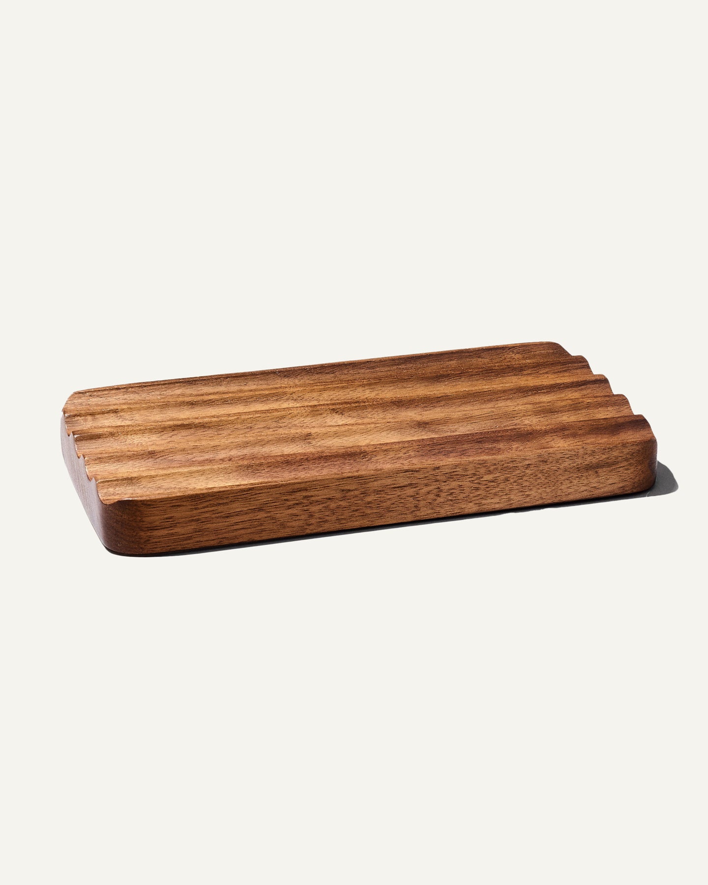 The modhaus solid wood wave pen tray