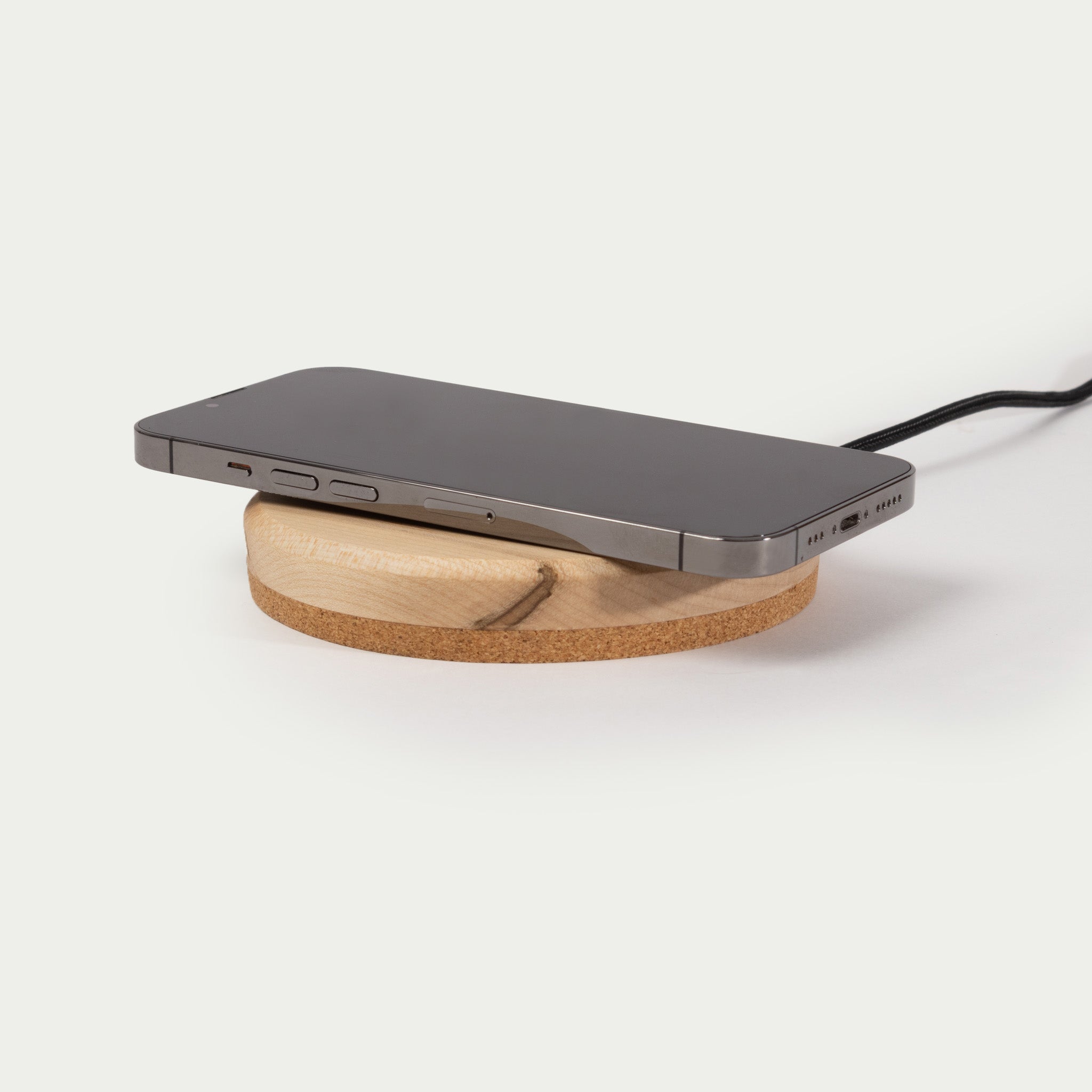 Modhaus' wireless charging pad in Maple wood. Qi Charging technology made with natural materials makes for an aesthetic minimal charger.