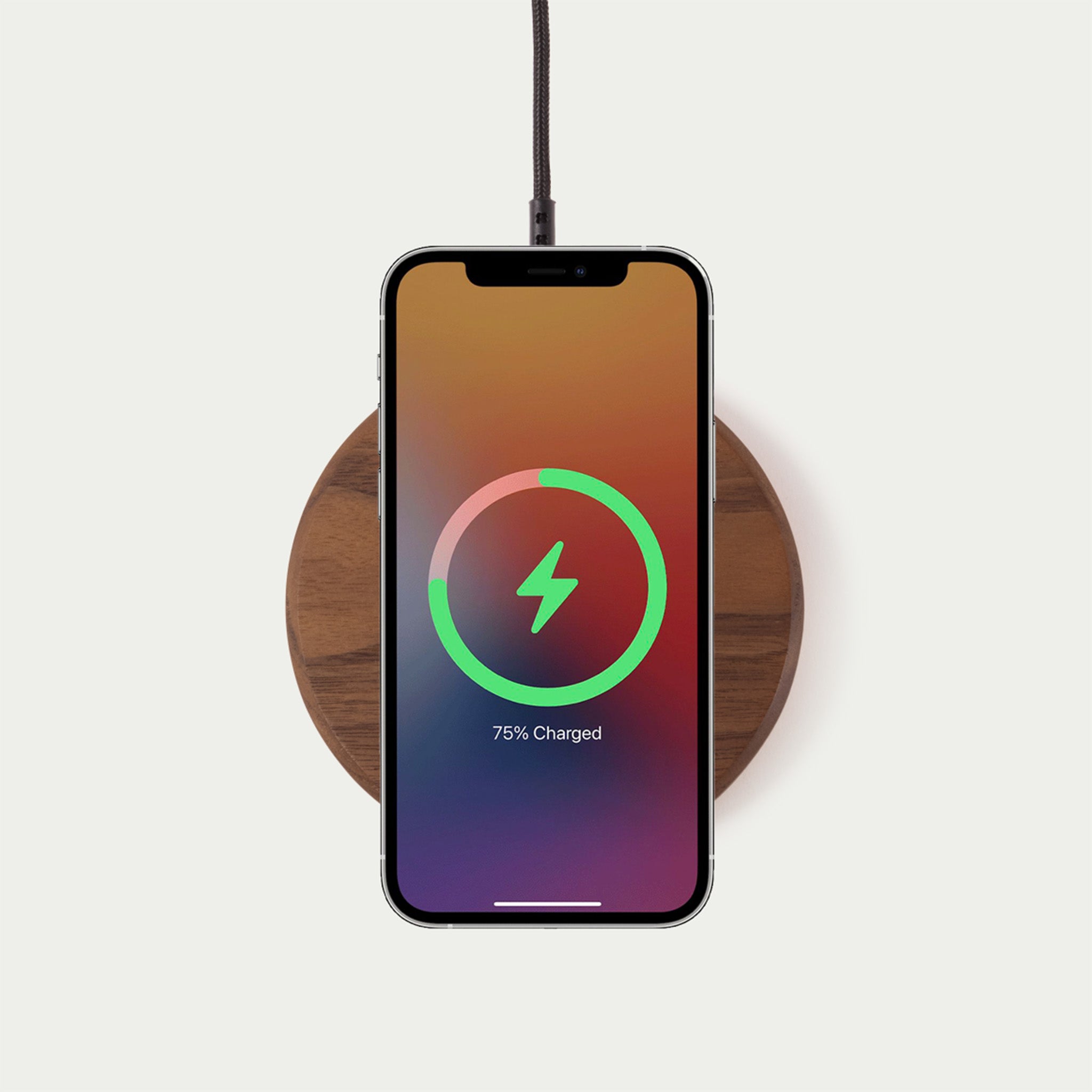 Modhaus' wireless charging pad in Walnut wood. Qi Charging technology made with natural materials makes for an aesthetic minimal charger.