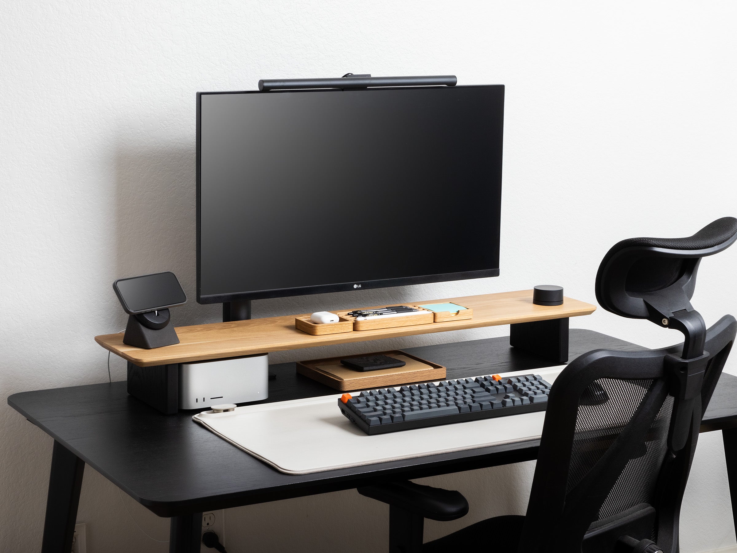 The Modhaus White Oak Desk Shelf on A black desk setup