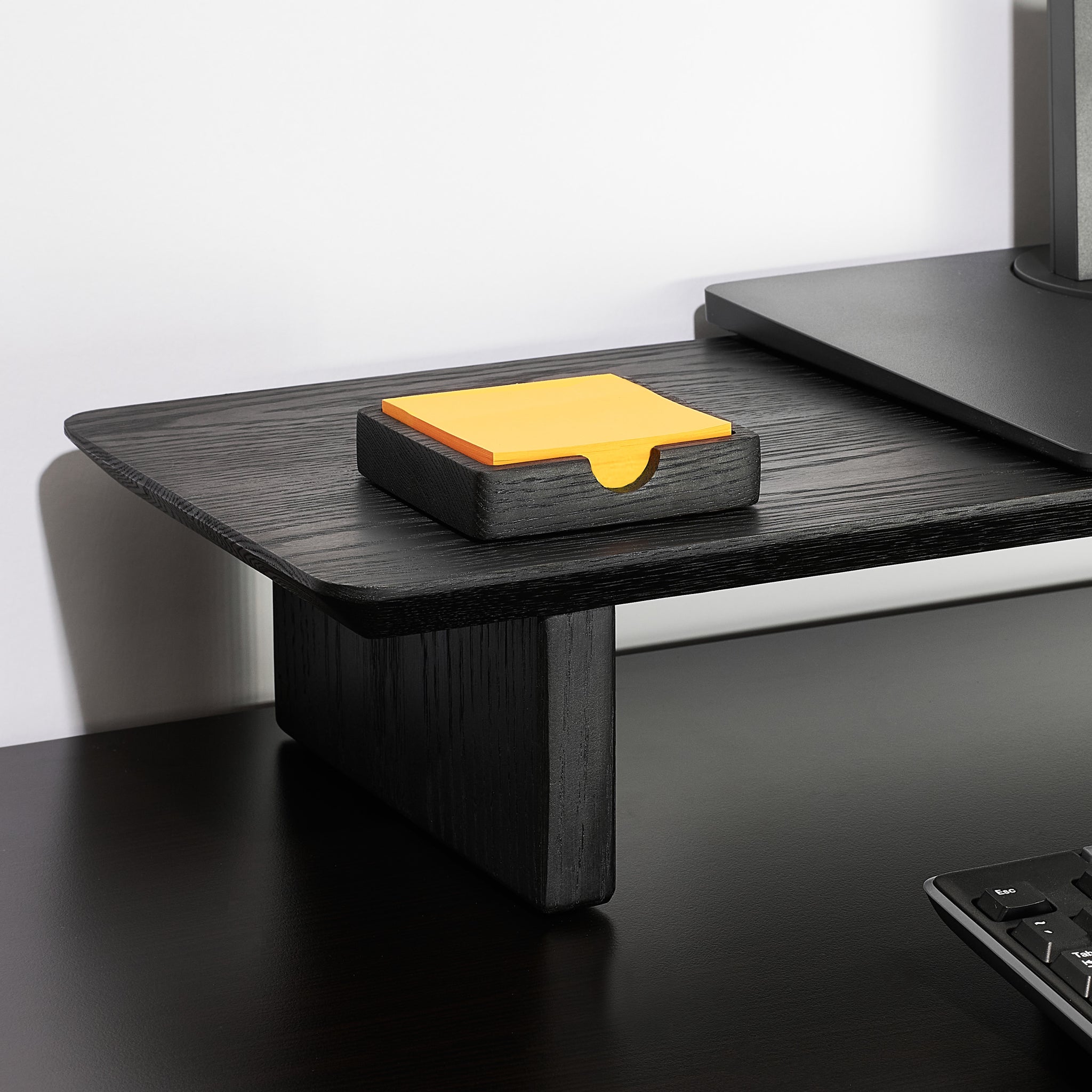 The Modhaus sticky note tray in black oak. Part of the larger Essentials set