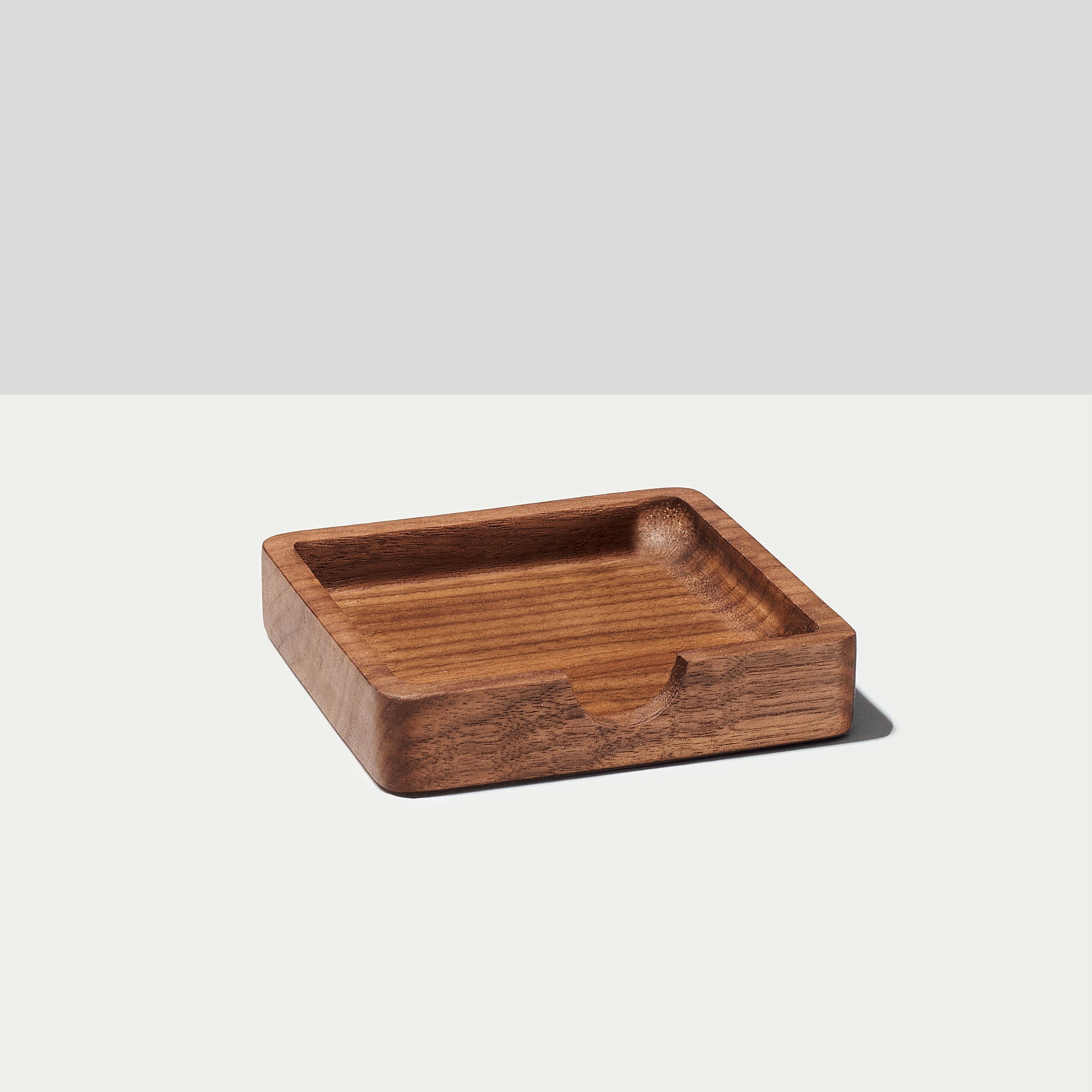 The Modhaus sticky note tray in Walnut. Part of the larger Essentials set